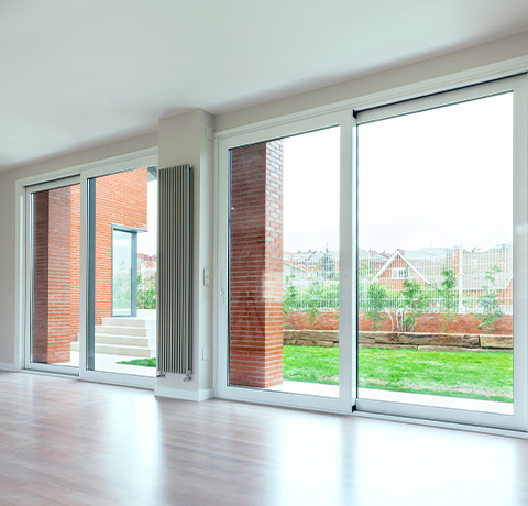 modern house exterior featuring REHAU windows and doors with contemporary design elements and brick accents showcasing quality craftsmanship and innovation 23 solutions for enhanced living