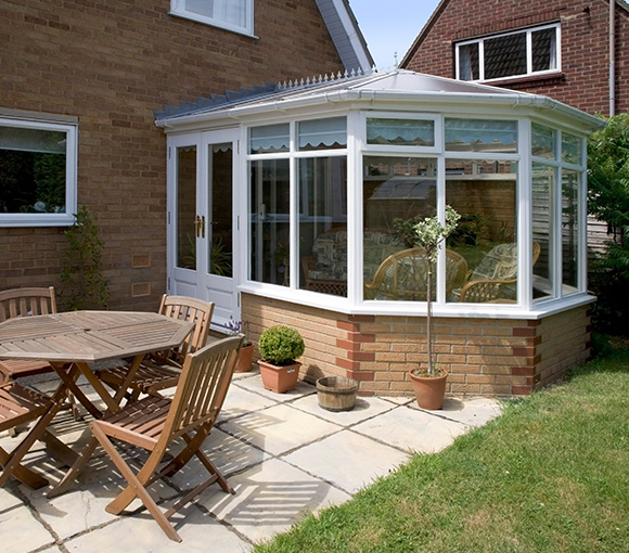 sunroom with patio seating and garden plants featuring modern design elements in a peaceful outdoor setting perfect for relaxing or entertaining 20 outdoor ideas and decor